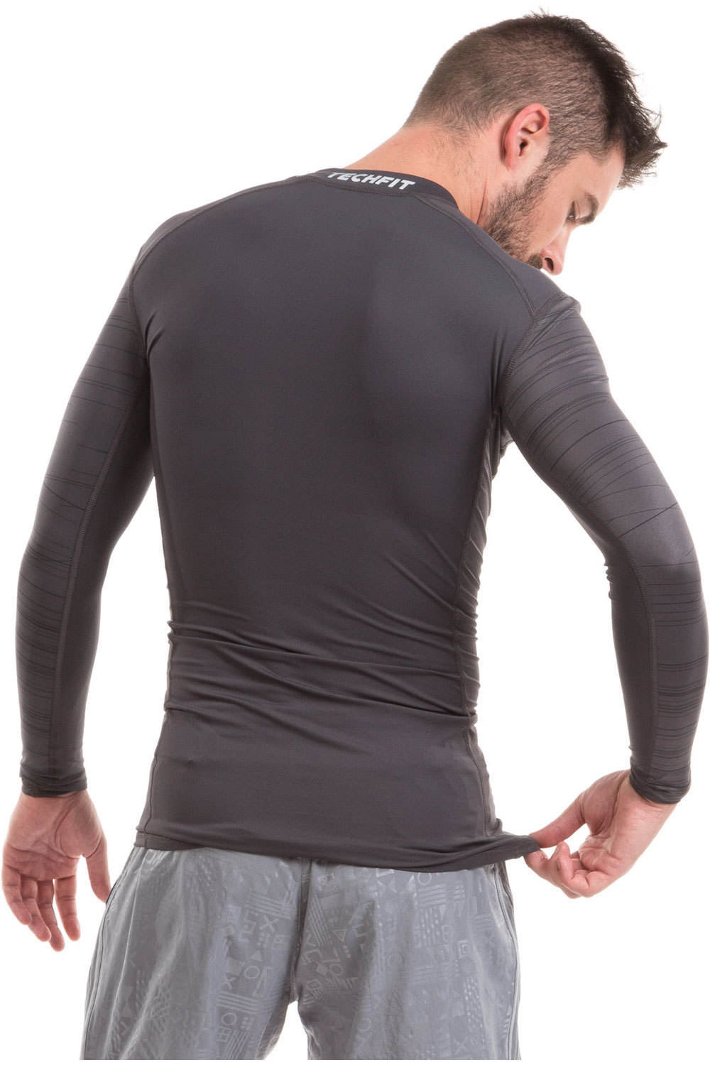 adidas camiseta térmica manga larga hombre Adidas TF TEE LS CL GX vista trasera adidas camiseta térmica manga larga hombre Adidas TF TEE LS CL GX vista trasera