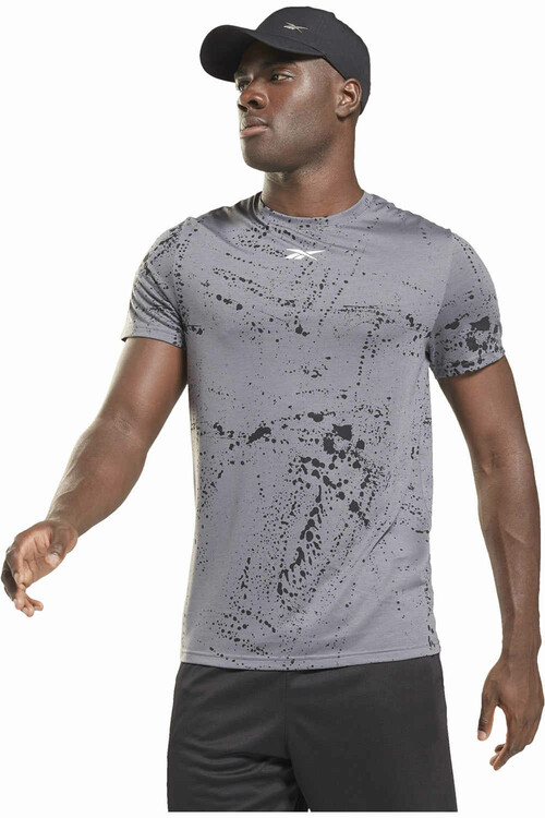 REEBOK WOR AOP SS TEE gris